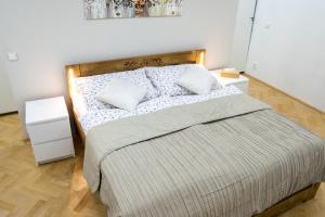 Ένα ή περισσότερα κρεβάτια σε δωμάτιο στο Apartment in downtown +7 φωτογραφίες