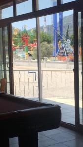 a view of a carnival from the window of a building at Mediterranean Apart Fethiye in Mugla