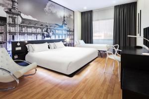 Voodi või voodid majutusasutuse B&B HOTEL Madrid Aeropuerto T4 toas