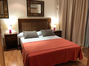 Postel nebo postele na pokoji v ubytování HOTEL V.CIUDAD + 24 fotografií