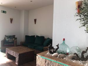 Posezení v ubytování HOTEL V.CIUDAD