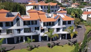 an aerial view of a large apartment building at Colinas do Sol in Funchal