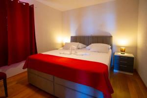Ένα ή περισσότερα κρεβάτια σε δωμάτιο στο Apartments Vladimir #5