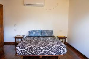 Ένα ή περισσότερα κρεβάτια σε δωμάτιο στο middle path