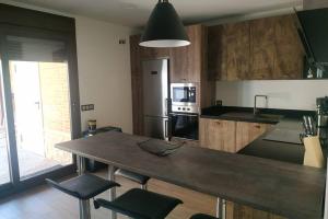 A kitchen or kitchenette at La Olma