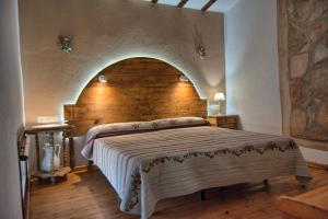 מיטה או מיטות בחדר ב-Posada Abuela Fidela