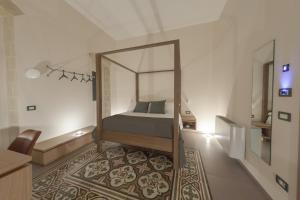 Postel nebo postele na pokoji v ubytování METEORON Luxury Rooms