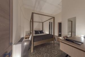 Postel nebo postele na pokoji v ubytování METEORON Luxury Rooms
