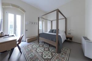 Postel nebo postele na pokoji v ubytování METEORON Luxury Rooms