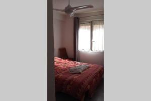 Letto o letti in una camera di Port Vauban appartement F3 refait à neuf