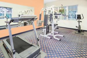 a dental room with a dental chair and machines at Microtel Inn & Suites by Wyndham Fond Du Lac in Fond du Lac
