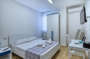 Horizon Suites客房内的一张或多张床位