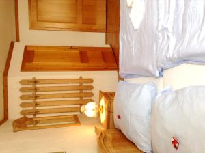 Ein Bett oder Betten in einem Zimmer der Unterkunft Frühstückspension zur Post Reisinger KG St Oswald