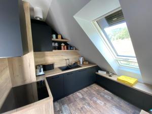 Kuchyňa alebo kuchynka v ubytovaní Apartament No.813 + 14 fotografií