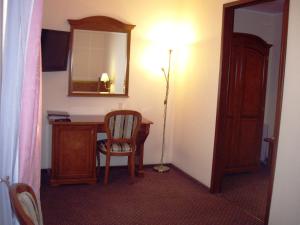 TV a/nebo společenská místnost v ubytování Art Hotel Academy