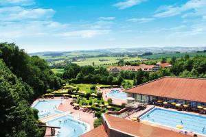 an aerial view of a resort with two pools at Ferienwohnung Wolfgang Halbinger in Bad Griesbach
