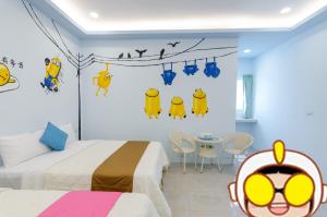 Ένα ή περισσότερα κρεβάτια σε δωμάτιο στο Mu Yu B&B