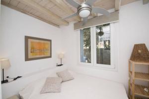 A bed or beds in a room at My Lovely Place Mykonos