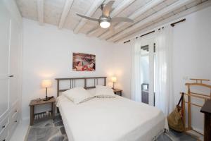 A bed or beds in a room at My Lovely Place Mykonos