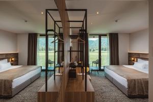 Postelja oz. postelje v sobi nastanitve Hotel Grof