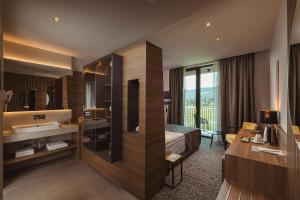 Postelja oz. postelje v sobi nastanitve Hotel Grof
