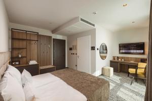 Postelja oz. postelje v sobi nastanitve Hotel Grof
