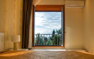 Postel nebo postele na pokoji v ubytování Apartments Athos