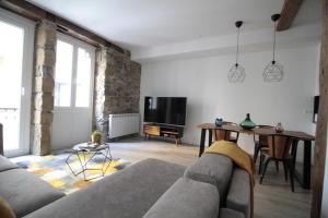 Telewizja i/lub zestaw kina domowego w obiekcie SunSet Bastian Apartment