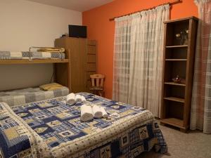 Una cama o camas en una habitación de Camera monte Pitturina