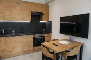 Kuchnia lub aneks kuchenny w obiekcie Apartamenty Dworcowa 45