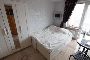 Ένα ή περισσότερα κρεβάτια σε δωμάτιο στο Pokoje u Mariusza