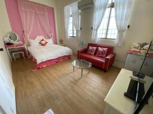 小城堡民宿Little Castle hotel 19窩窩近東大門夜市好停車房間的床