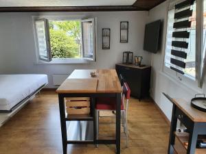 Rúm í herbergi á Le Petit Beurre de cacahuète et Le Poivre et Sel