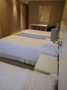 Postel nebo postele na pokoji v ubytování Hotel Manta