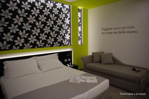 A bed or beds in a room at HOLYGOLD Suite ****