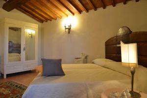 En eller flere senge i et værelse på Fonte Comelia