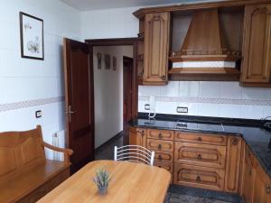 A kitchen or kitchenette at Apartamentos Los Frutales