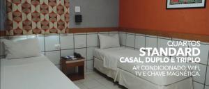 Cama ou camas em um quarto em Inter Hotel