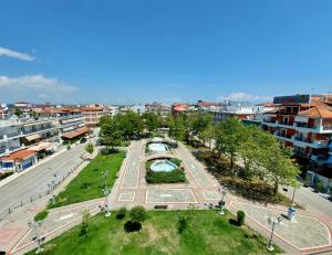 a city with a lot of trees and buildings at Haus Olymp in Paralia Katerinis