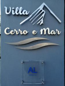 a sign for a restaurant with a fork and knife at VILLA CERRO E MAR in Moncarapacho