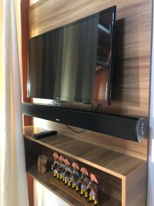 A television and/or entertainment centre at Winterville Resort em Gravatá/PE