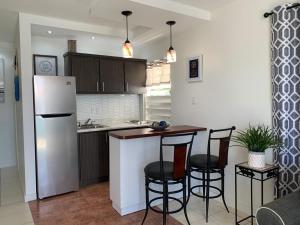 Kuchyň nebo kuchyňský kout v ubytování Mar Bonita Beach Apartment + 26 fotografií