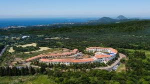 an aerial view of a building on a hill at Club ES Jeju Resort in Seogwipo