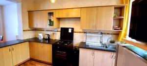 Kuchyň nebo kuchyňský kout v ubytování Tranquille Homestay near JKIA Airport & SGR Station Nairobi + 8 fotografií