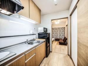 Kuchyň nebo kuchyňský kout v ubytování Terrace Resort Chatan West