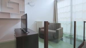 TV a/nebo společenská místnost v ubytování Italianway - Torno