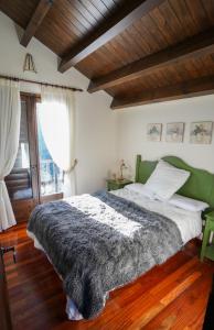 Кровать или кровати в номере LA CASA d'en RAFEL