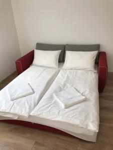 Postel nebo postele na pokoji v ubytování Veritas Apartment Zamárdi