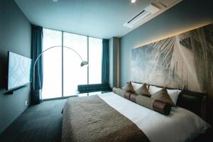 Postelja oz. postelje v sobi nastanitve HOTEL BLAX