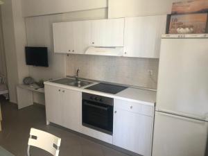 Kuchyň nebo kuchyňský kout v ubytování Makis Apartments Touzla